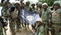 Nigeria Aarmy pose with Boko Haram flag