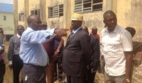 Ag Provost of School of Marine Technology, iCEO Anuku (left) explaining apoint to Chairman Governing Council of the school, Barr. Ia Clark (on suit) while other members look on