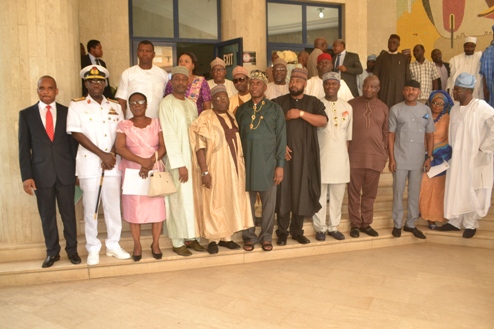 A photograph of the Hon Minister of Transportation with some National Assembly members and members of the Board of the Nigerian Maritime Administration and Safety Agency (NIMASA) after the inauguration of the Board in Abuja.