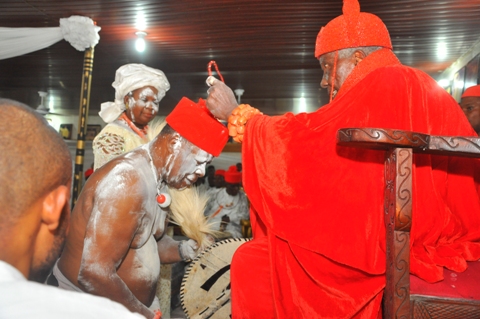 Chief Samson Okuesa receiving chieftaincy title from HRM Ohworode of Olomu Kingdom