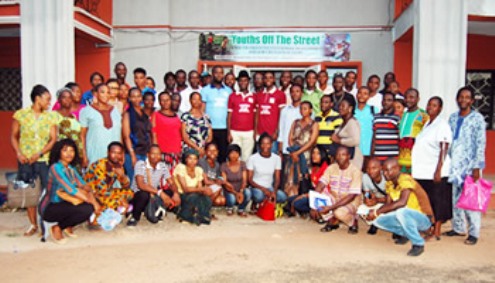 Nigerians who benefitted from the empowerment programme of Youths Off The Streets Initiative in group picture
