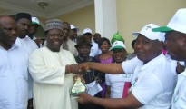Rt Hon. (Chief)  Emaye Ominimini Obiuwevbi receiving award of excellence from Comrade Godspower Okagbare, President Delta Central PDP Youth Vanguard